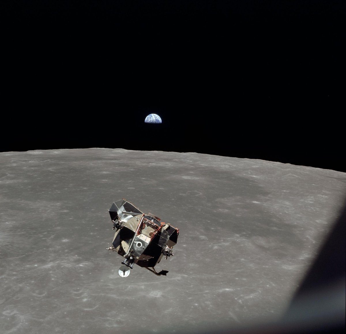 Earth visible in the background as part of the Apollo 11 mission 