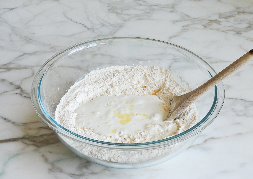 adding buttermilk and butter to dry ingredients
