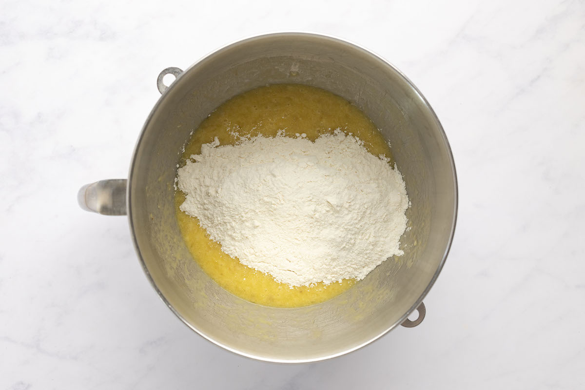 flour, salt, and baking powder fully combined with wet mixture in metal mixing bowl