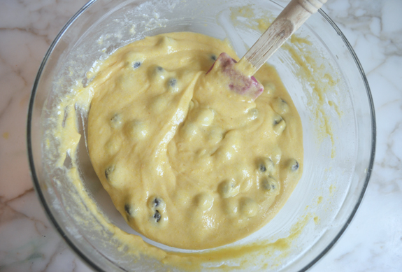 Blueberry cornbread muffin batter in a bowl.