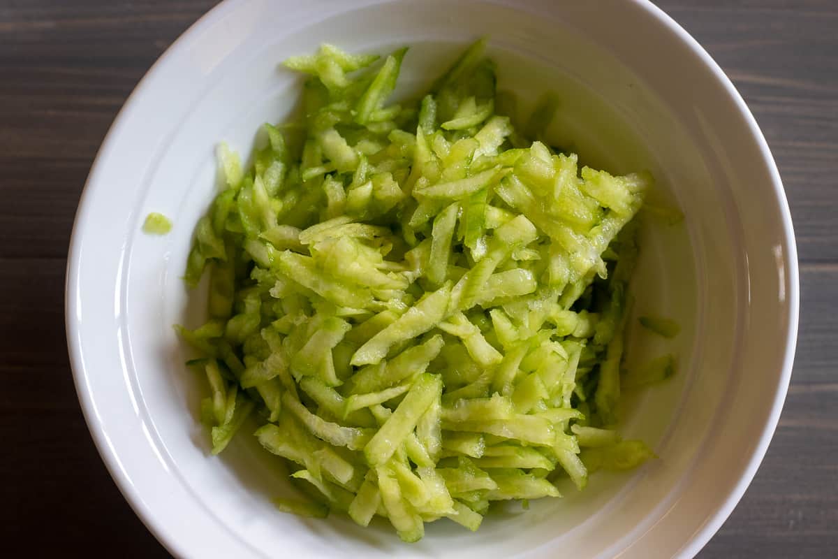 grated cucumber is placed in a bowl