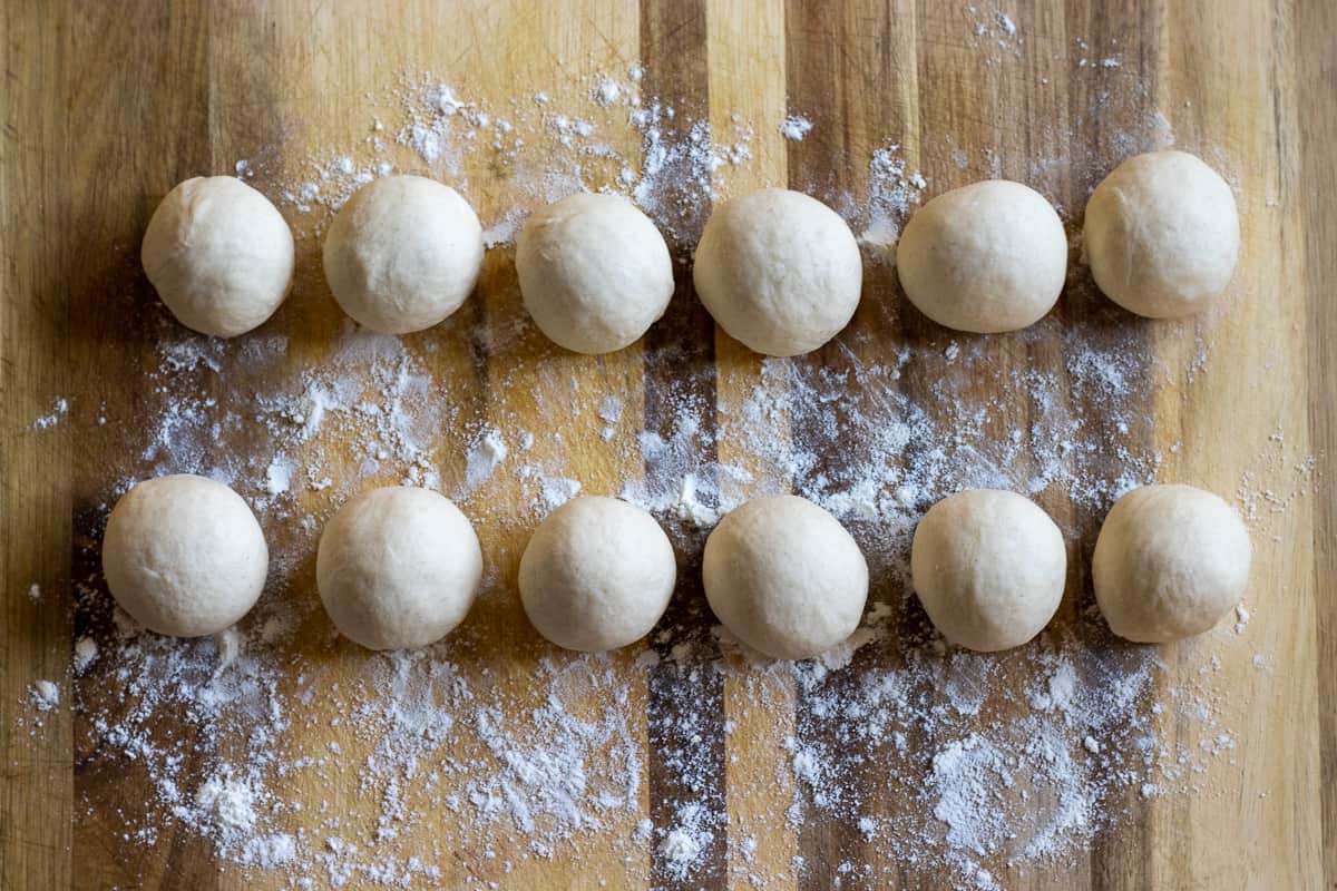 the dough is divided into 12 equal balls