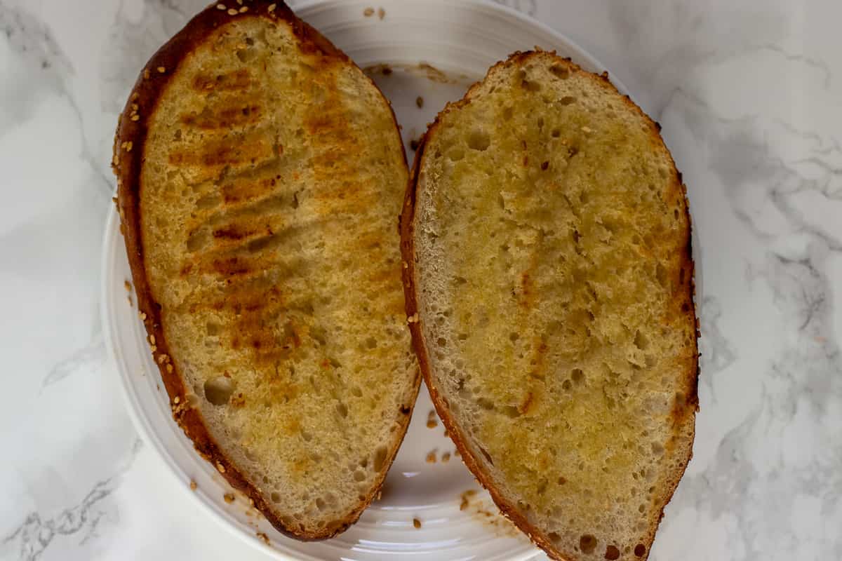 kumru bread is cut in half and grilled