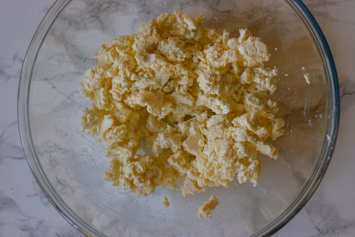 feta is crumbled in a glass bowl