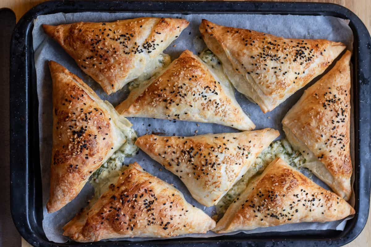 cheese boreks are baked until golden and crispy 