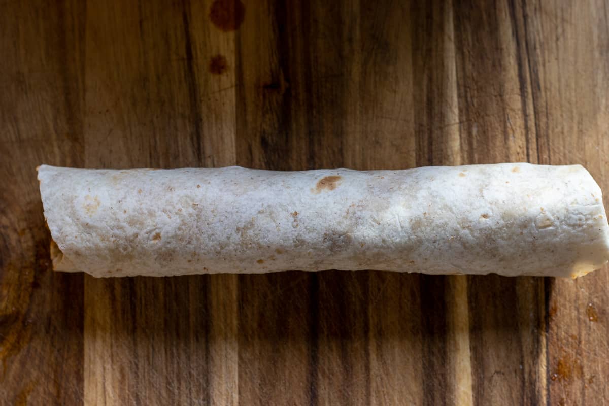 Lavash is tightly wrapped to form the tantuni wrap