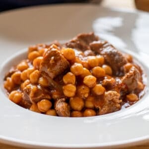 lamb and chickpea stew served in a white plate
