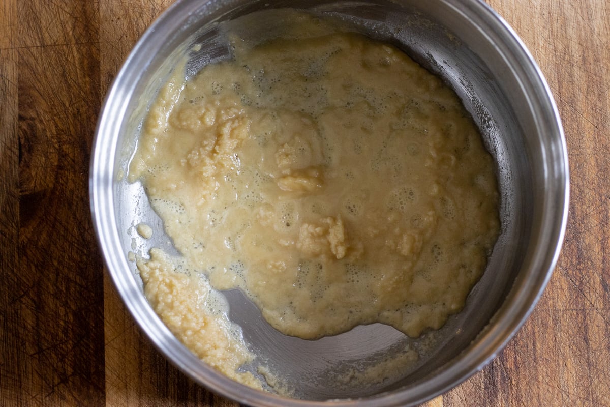 flour is mixed with melted butter