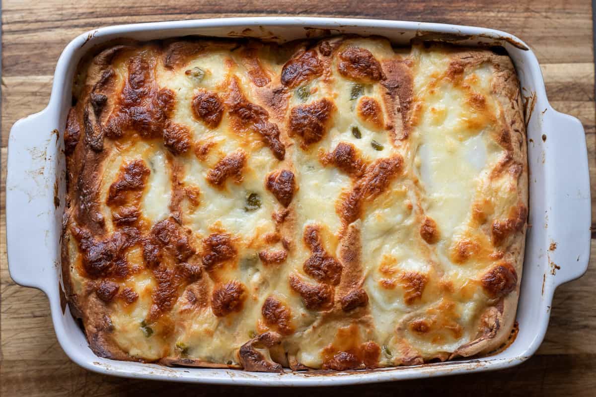 enchiladas are baked until golden and bubbly