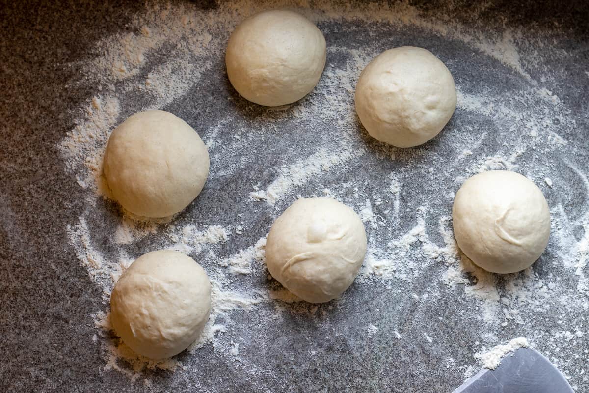 the dough divided into 6 equal pieces