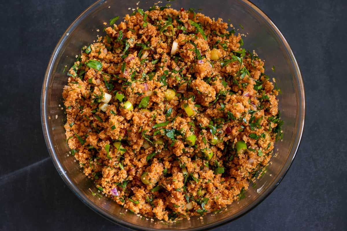 The vegetables and herbs are added to bulgur