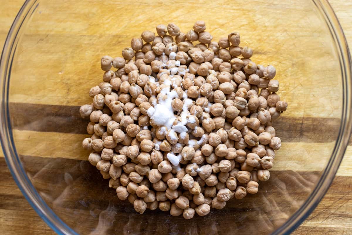 chickpeas and bicarbonate of soda in a glass bowl