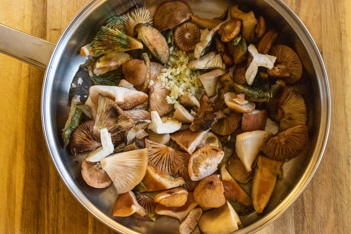 Sautéing the mushrooms in a pan