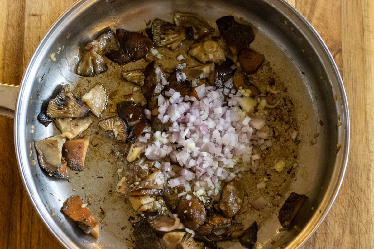 shallots are added to sautéed mushrooms 