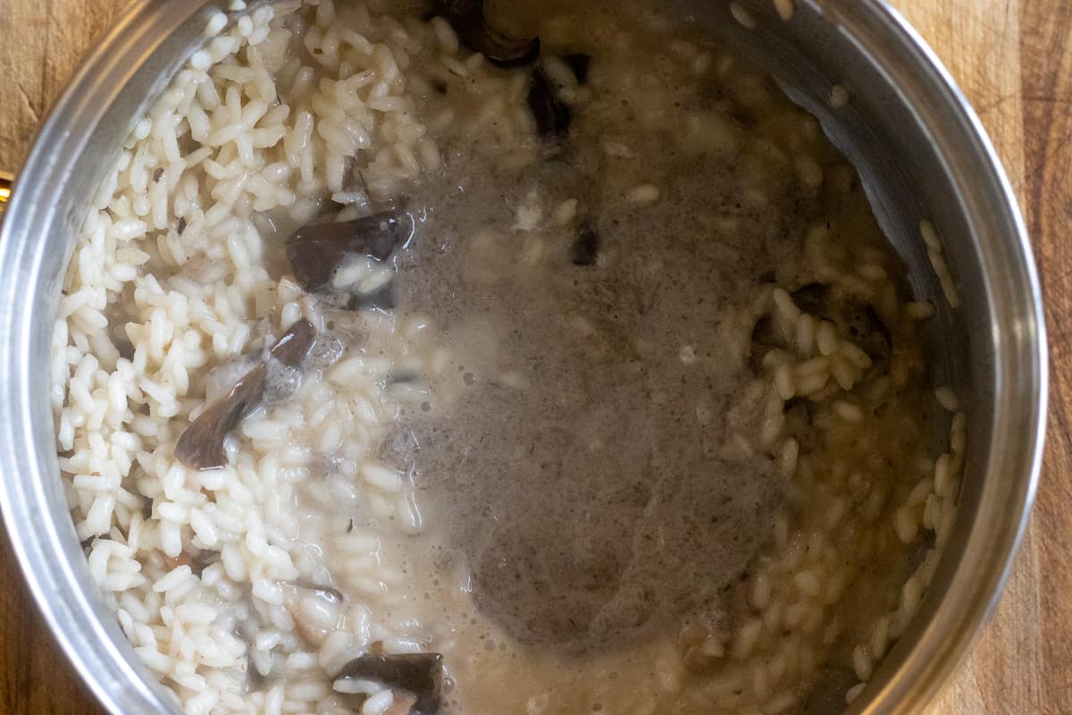 Mushroom purée is added to risotto