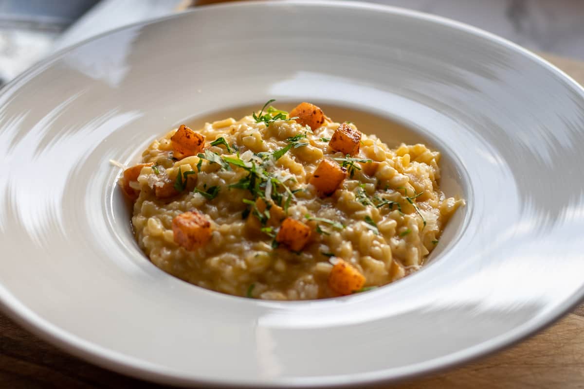 pumpkin risotto served in a bowl