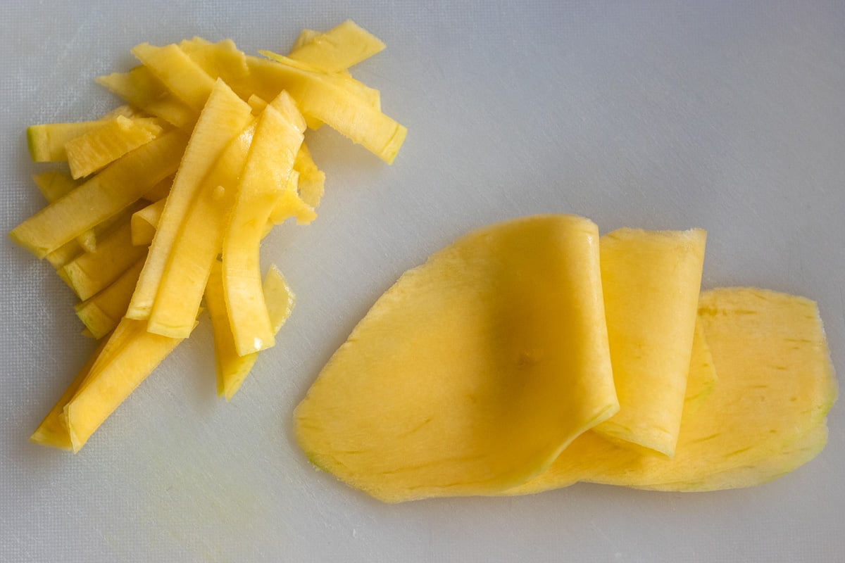 mango is cut in julienne