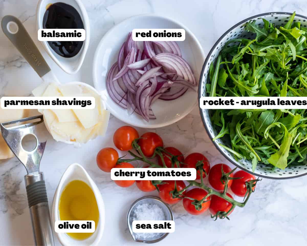 Labelled picture of ingredients for rocket and Parmesan Salad