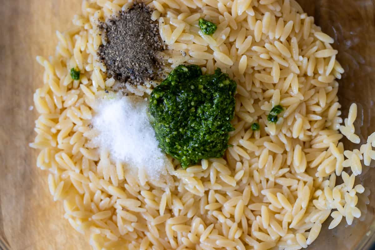 salt, pepper and pesto added to cooked orzo