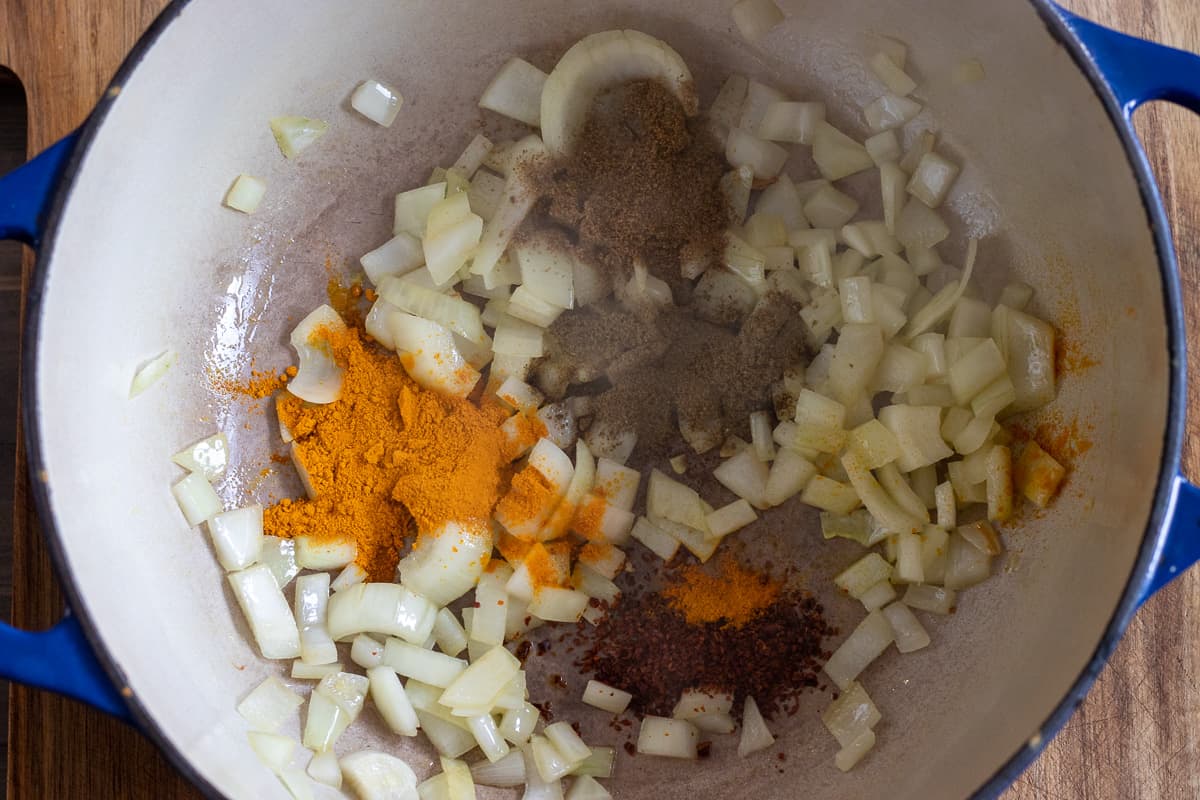 spices are added to the sautéed onions