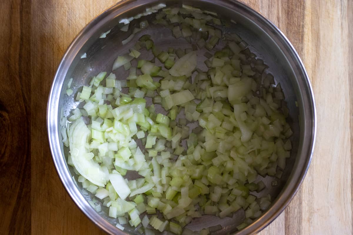 Sautéing the onions and celery with olive oil