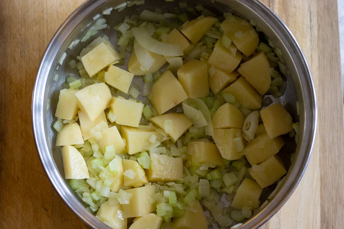 potatoes are added to the pan