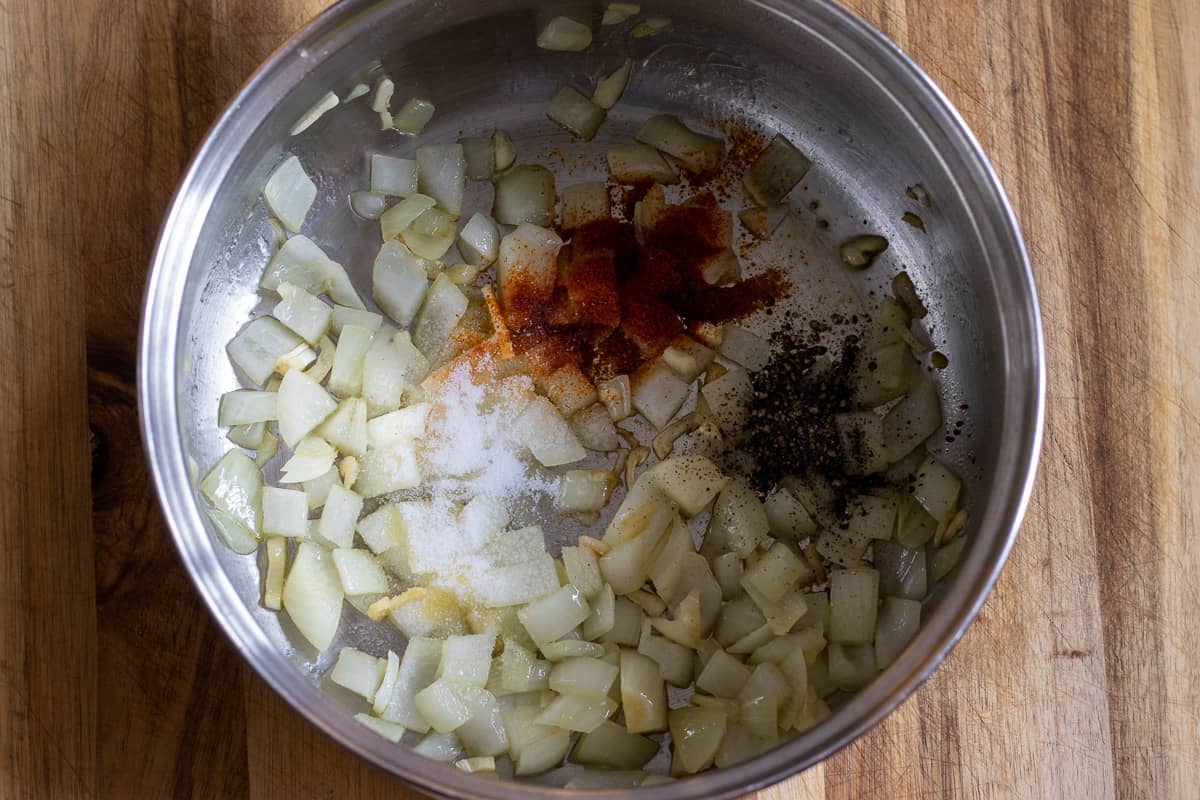Spices are added to the onions