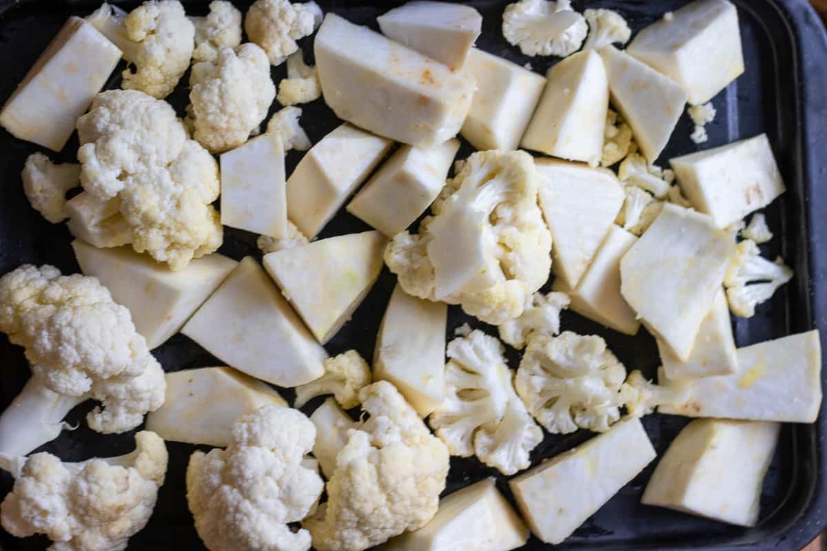 celeriac and cauliflower are placed on a tray
