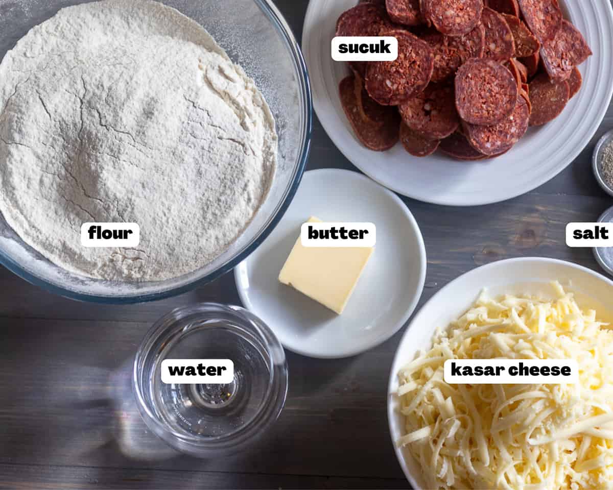 labelled picture of ingredients for Sucuklu Pide (Turkish Bread with Spicy Sausage)