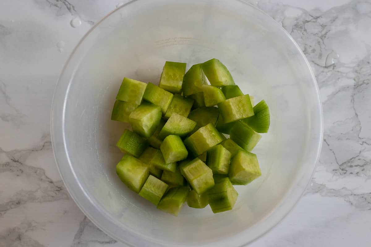 diced cucumbers are placed in a bowl
