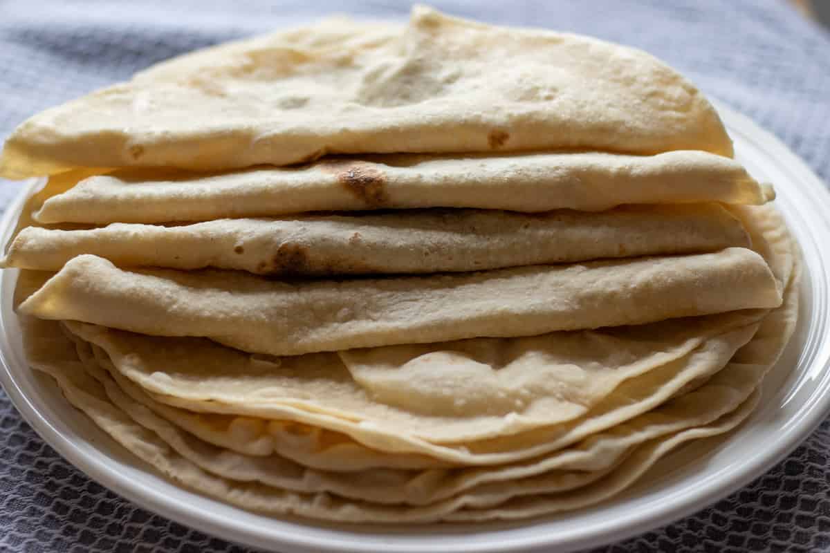 freshly made soft lavash bread on a plate