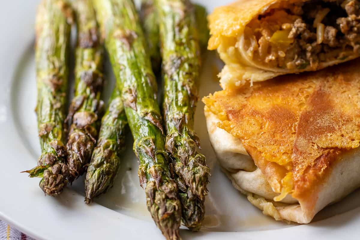 air fryer asparagus served as a side dish to grilled cheese burrito 
