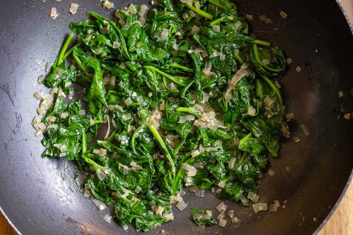 spinach is cooked until wilted