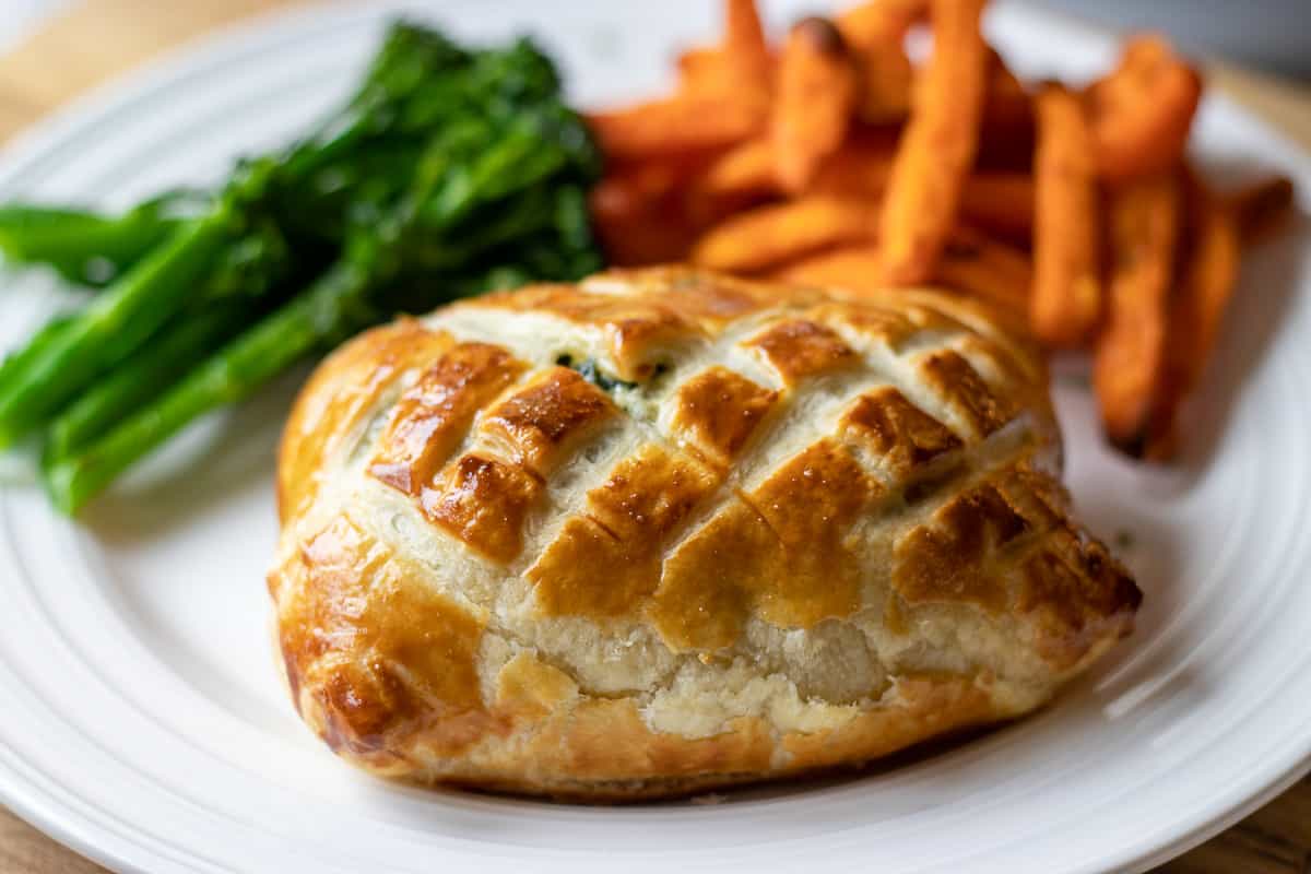 salmon wellington freshly baked and served on a plate 