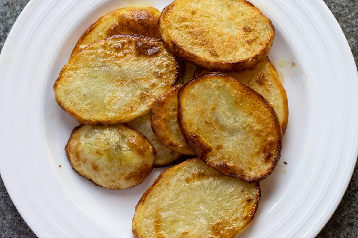 fried potato slices on a plate
