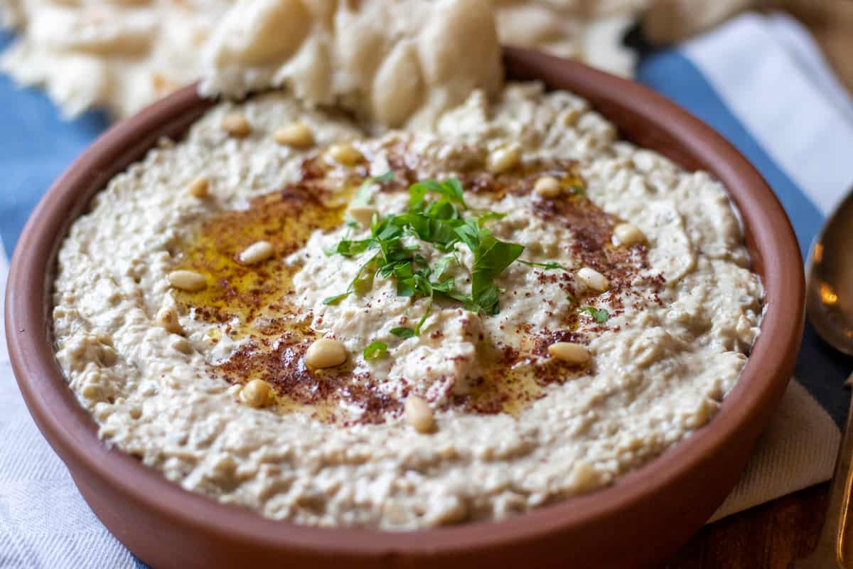 Mutabal (Roasted Eggplant Dip) served with pita bread for dipping