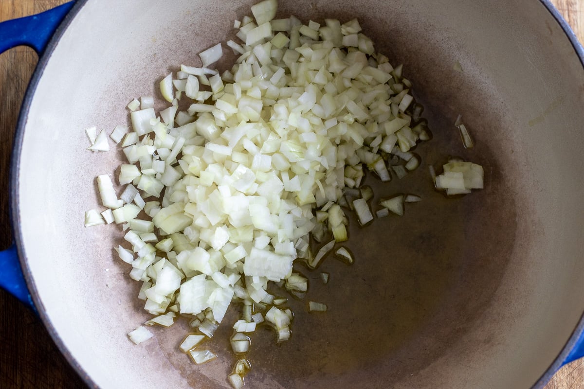 Sautéing the onions in a dutch oven with olive oil