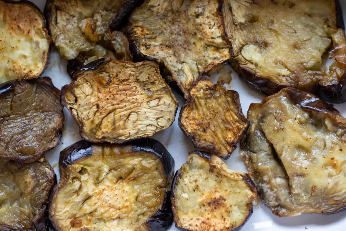 roasted eggplant slices on a tray 