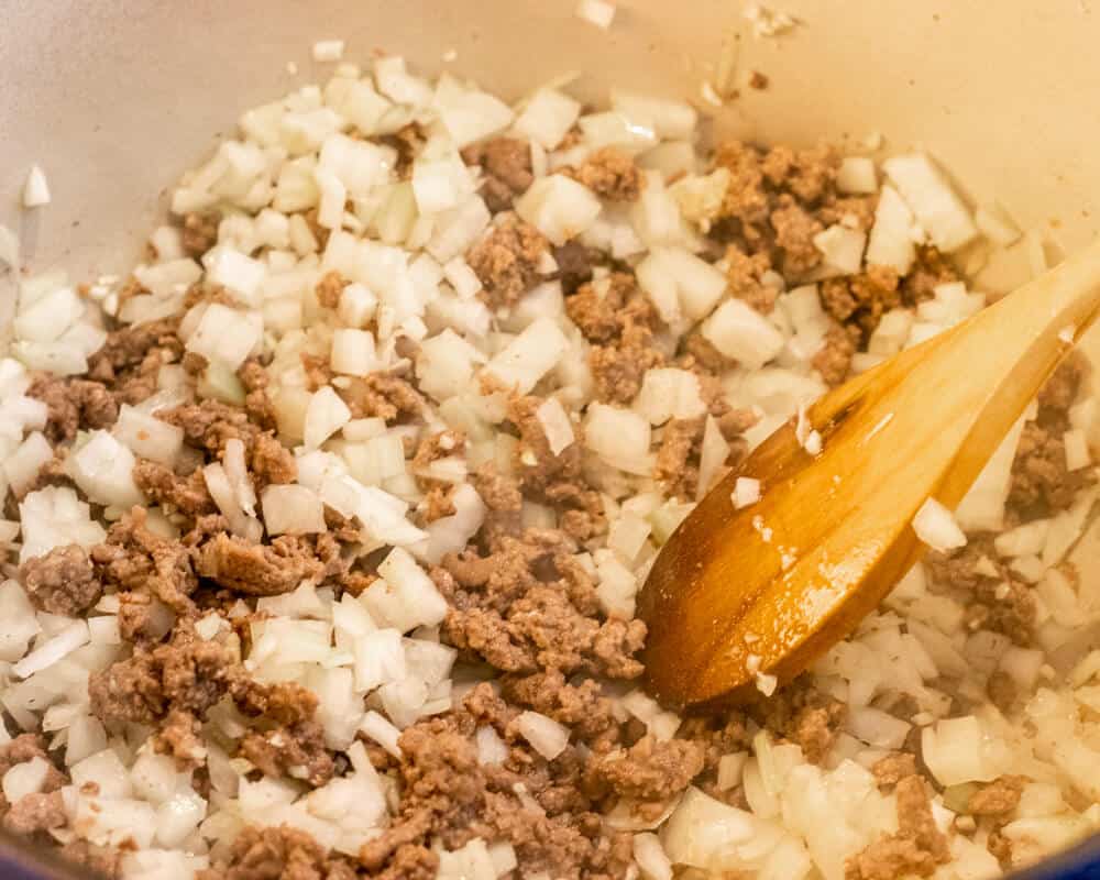Sautéing the onions with the mince