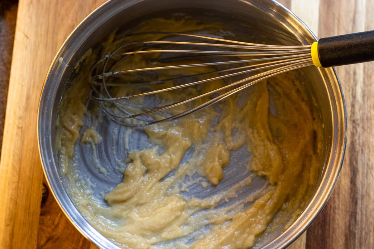 the melted butter is mixed with flour to make the béchamel