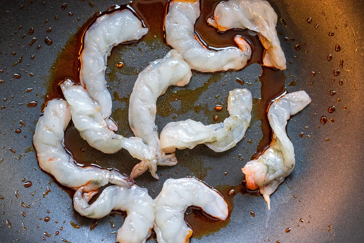 Cooking the prawns in the same pan