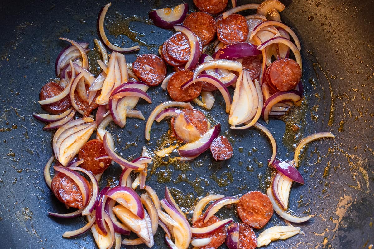 Sautéing the red onions and garlic