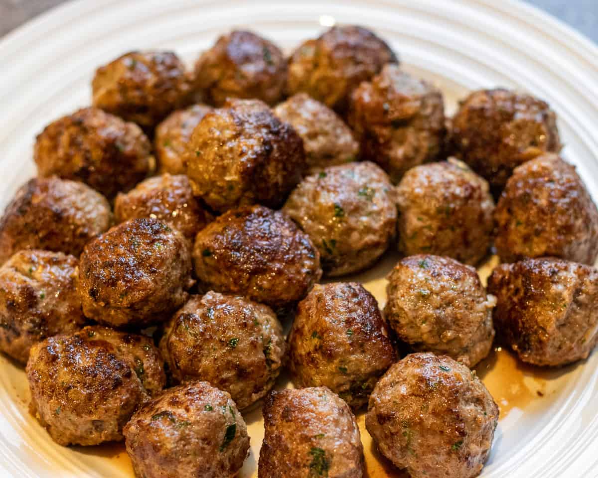 meatballs are sautéed until brown and removed to a plate