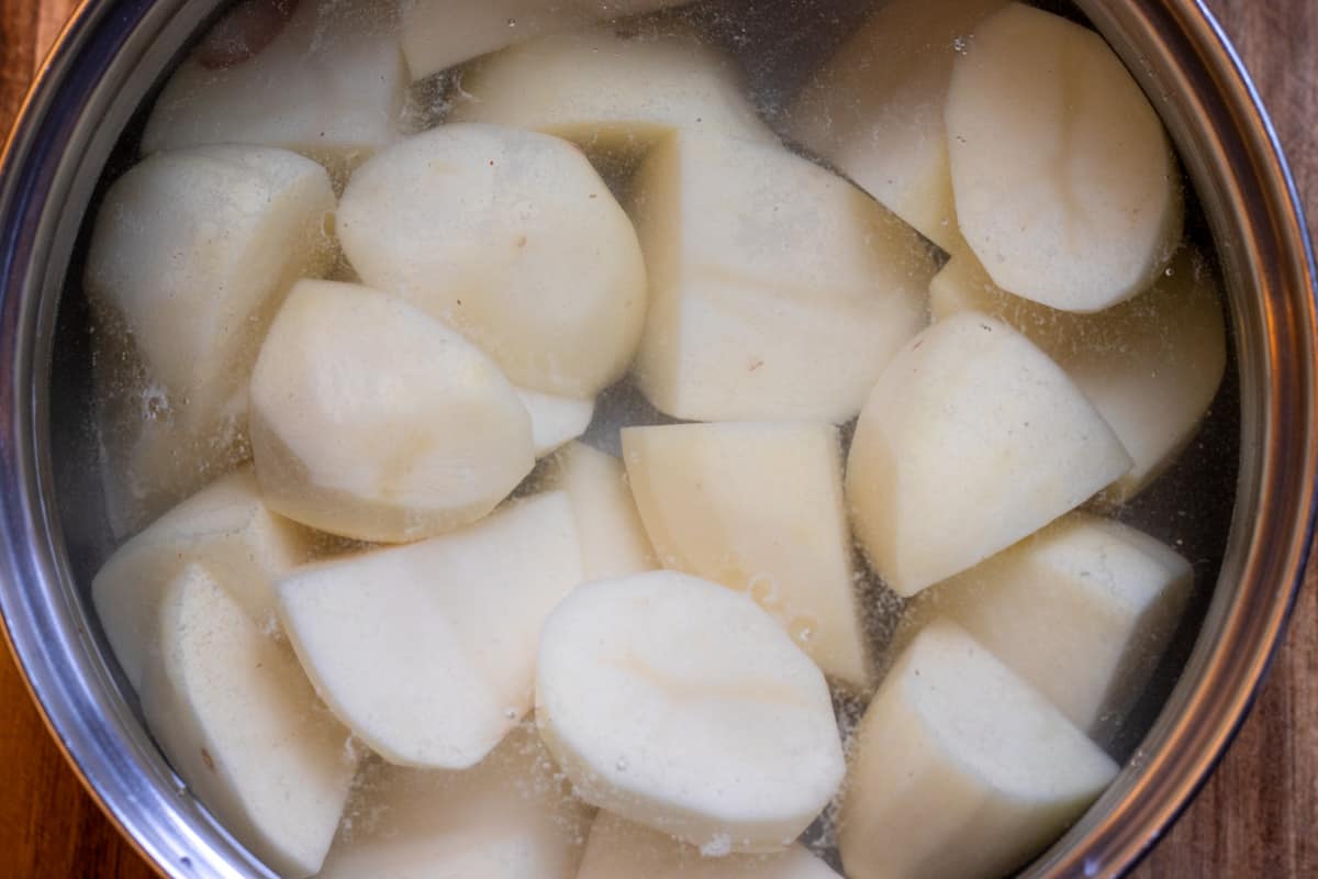 par boil the potatoes until almost cooked