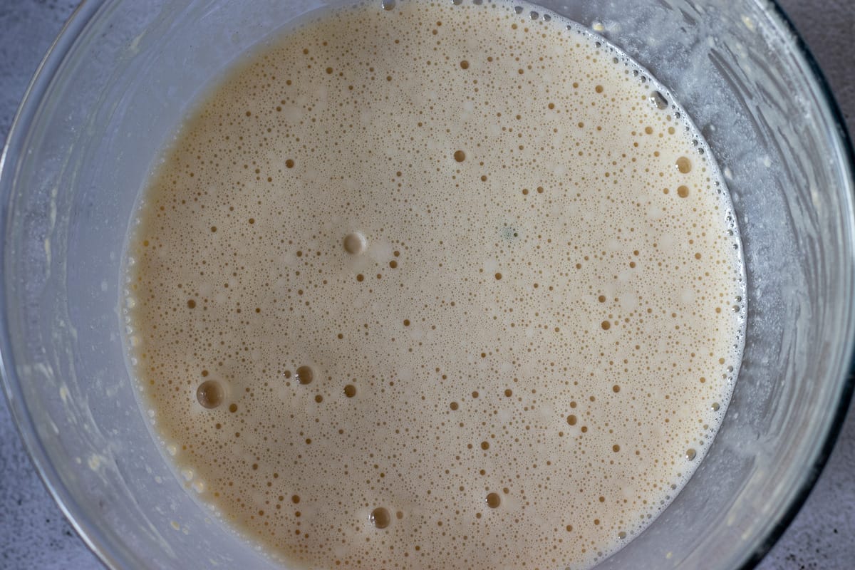 the flour is added to eggs and milk mixture