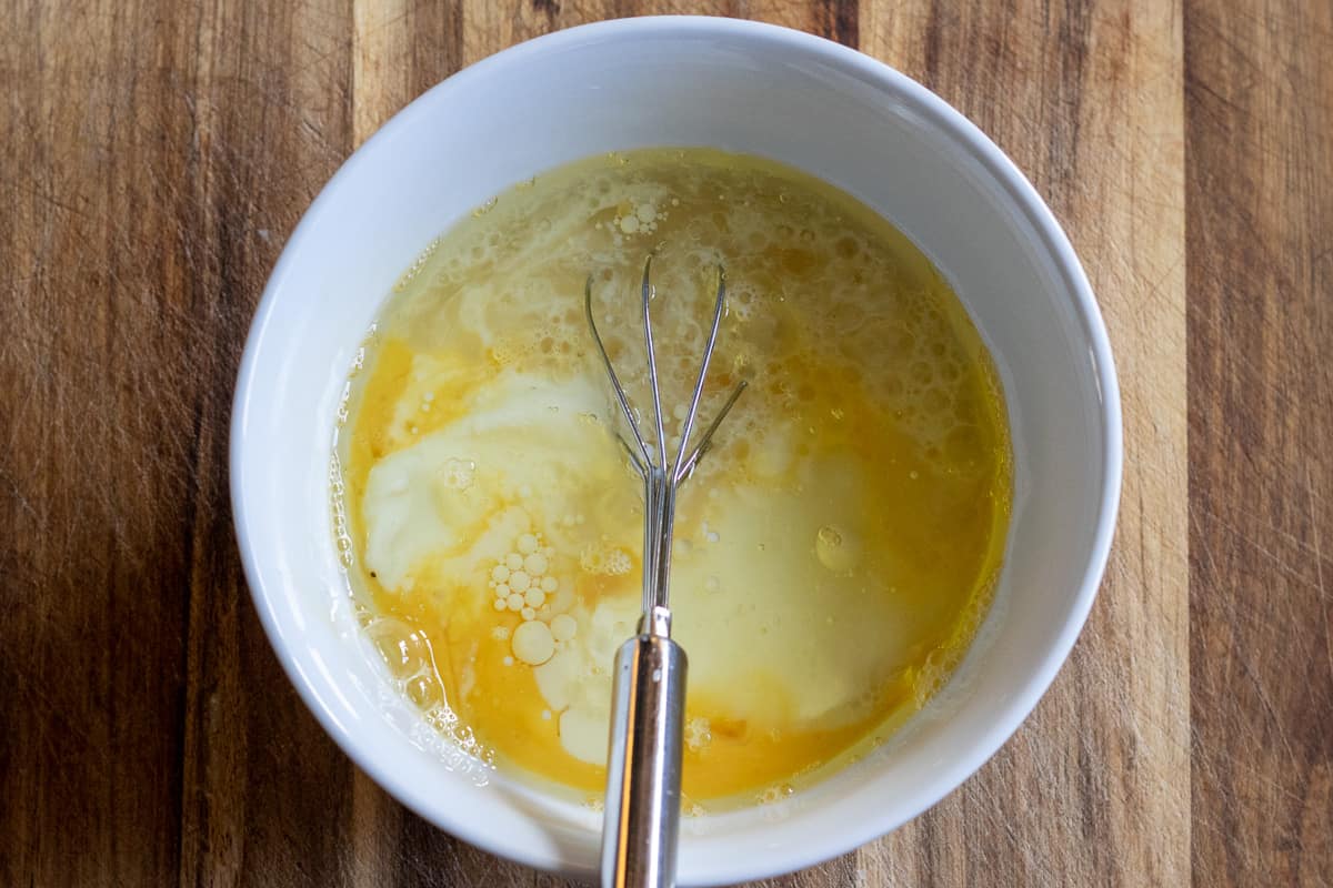 milk, yoghurt and vinegar are added to the egg