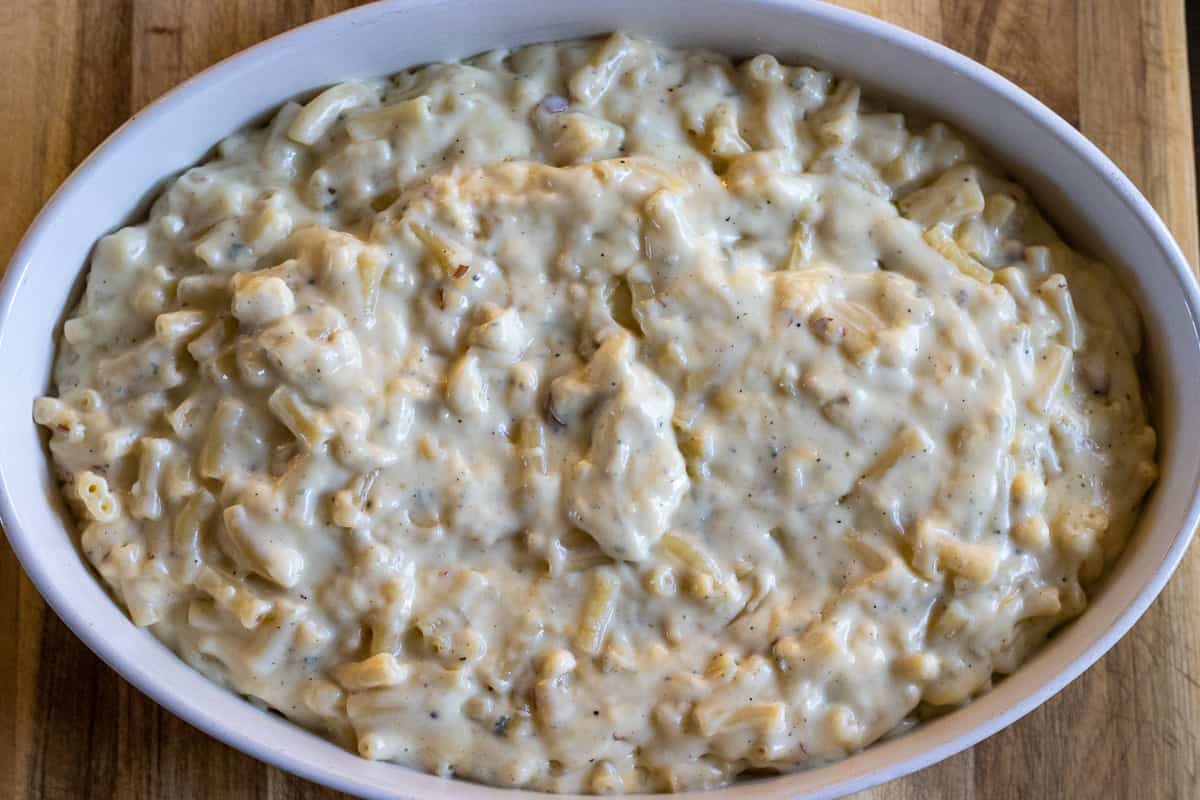 macaroni cheese is placed in a baking dish