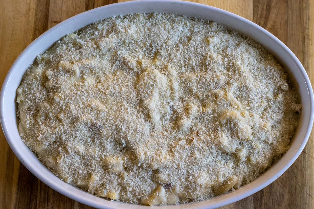 panko breadcrumbs are sprinkled on macaroni cheese