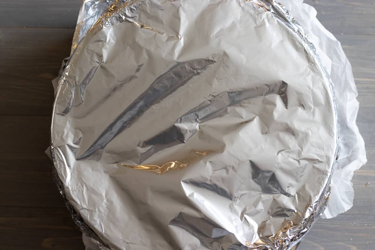 the guvec is covered with tin foil before baking in the oven