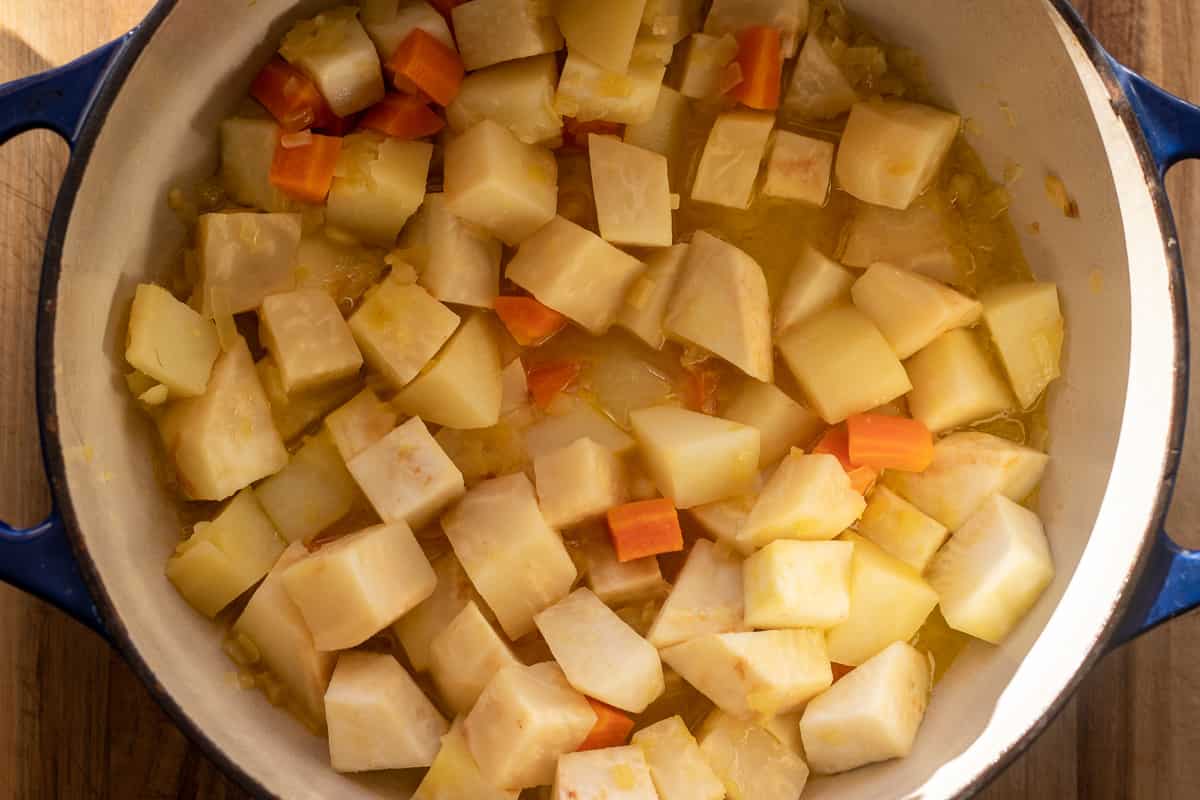 celeriac, carrots and potatoes are braised until soft